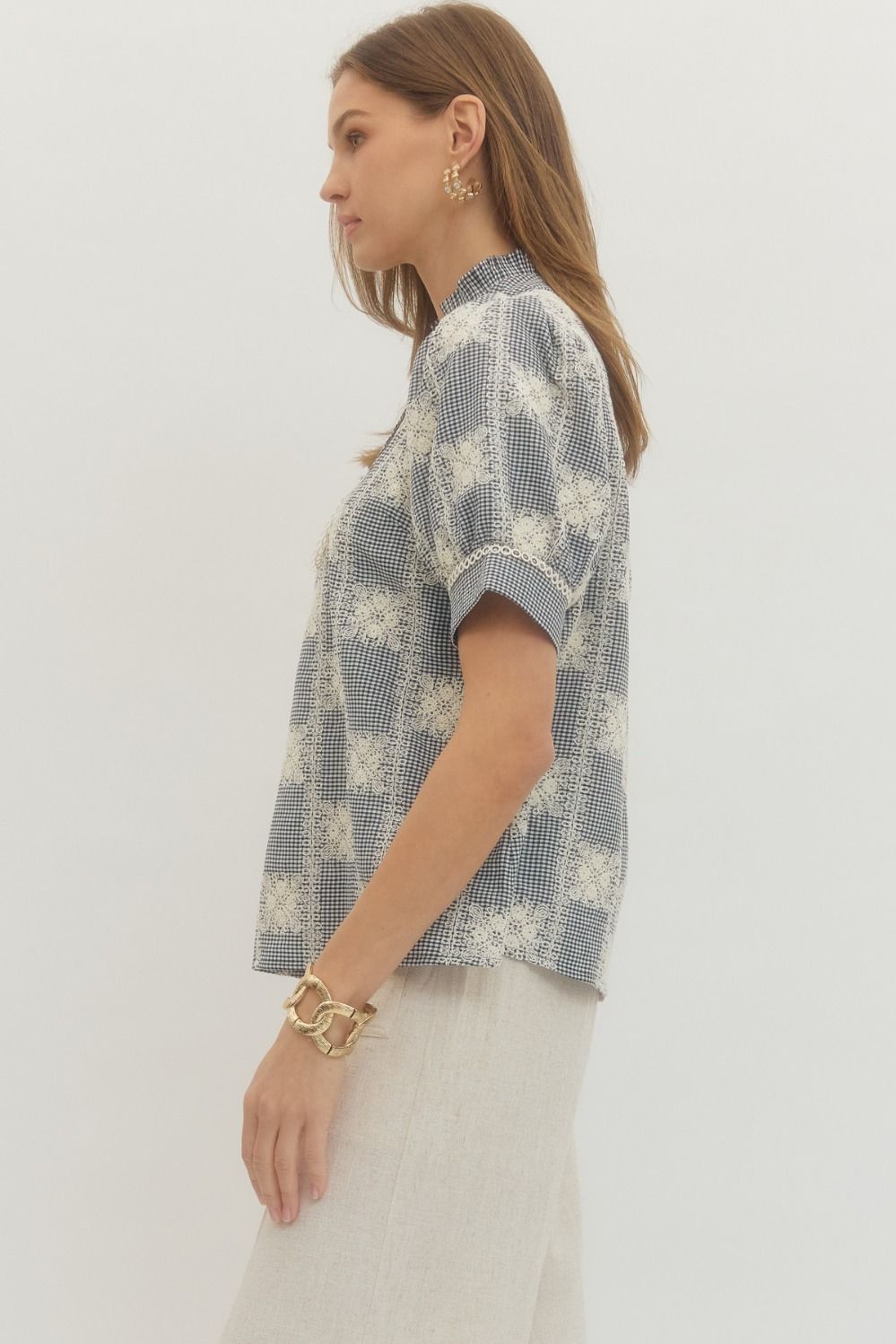 Amanda Gingham Puff Sleeve Top in white with black gingham pattern featuring unlined woven fabric and lightweight silhouette.