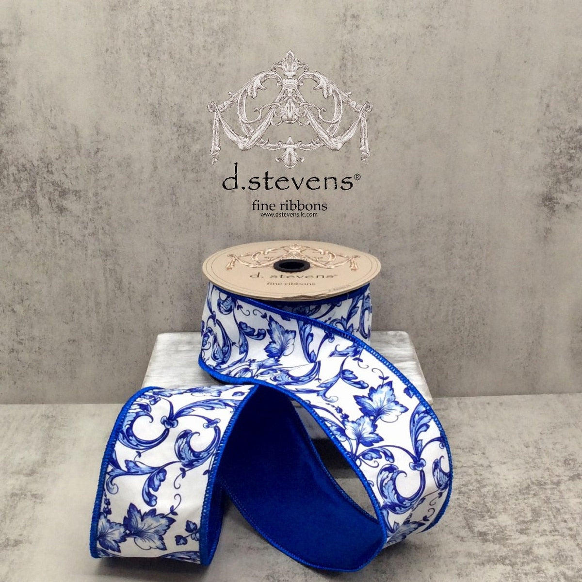 Taffeta ribbon with Acanthus Scroll Chinoiserie pattern in a neutral tone.