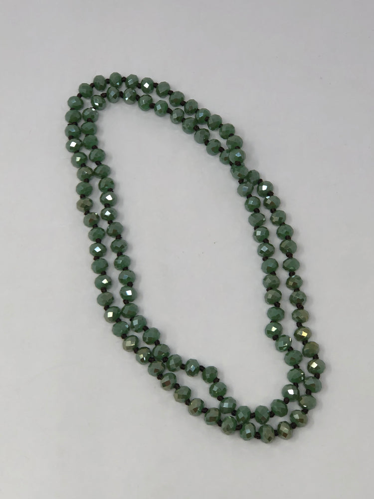 36-inch dark brown crystal beaded necklace with knotting between each bead