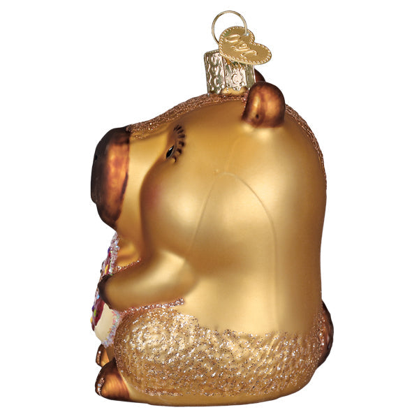 Capybara eating donut ornament in pastel blue ceramic with white glaze