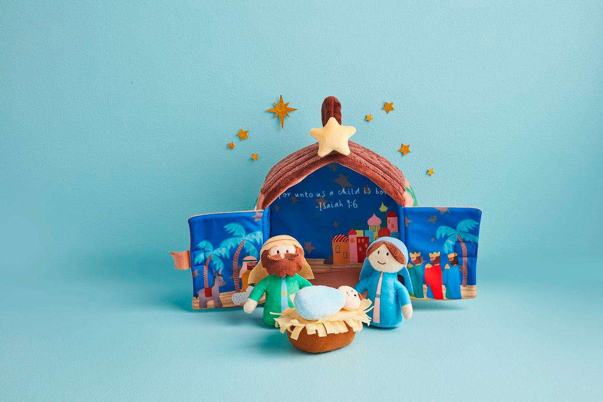 Musical Nativity plush set featuring polyester figures in warm tones with soft rounded silhouettes.