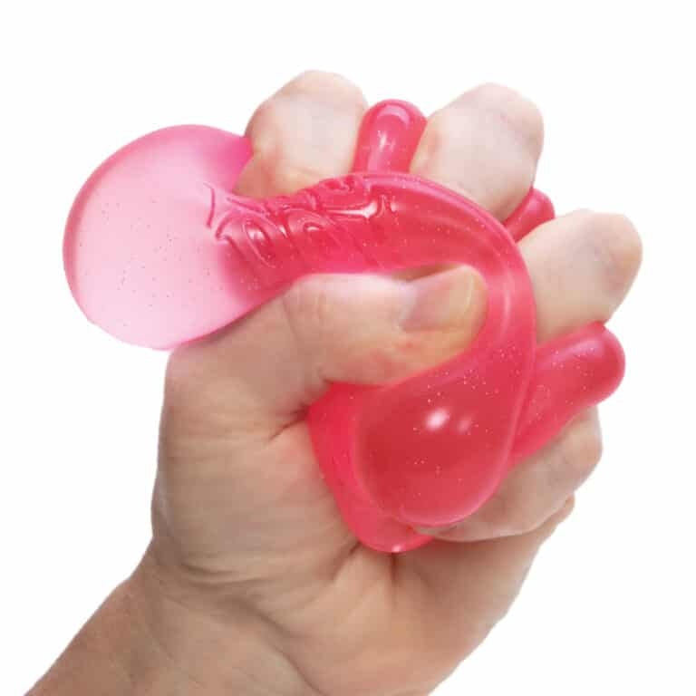 Pink semi-transparent square NeeDoh Nice Cube stress toy with slow squish texture