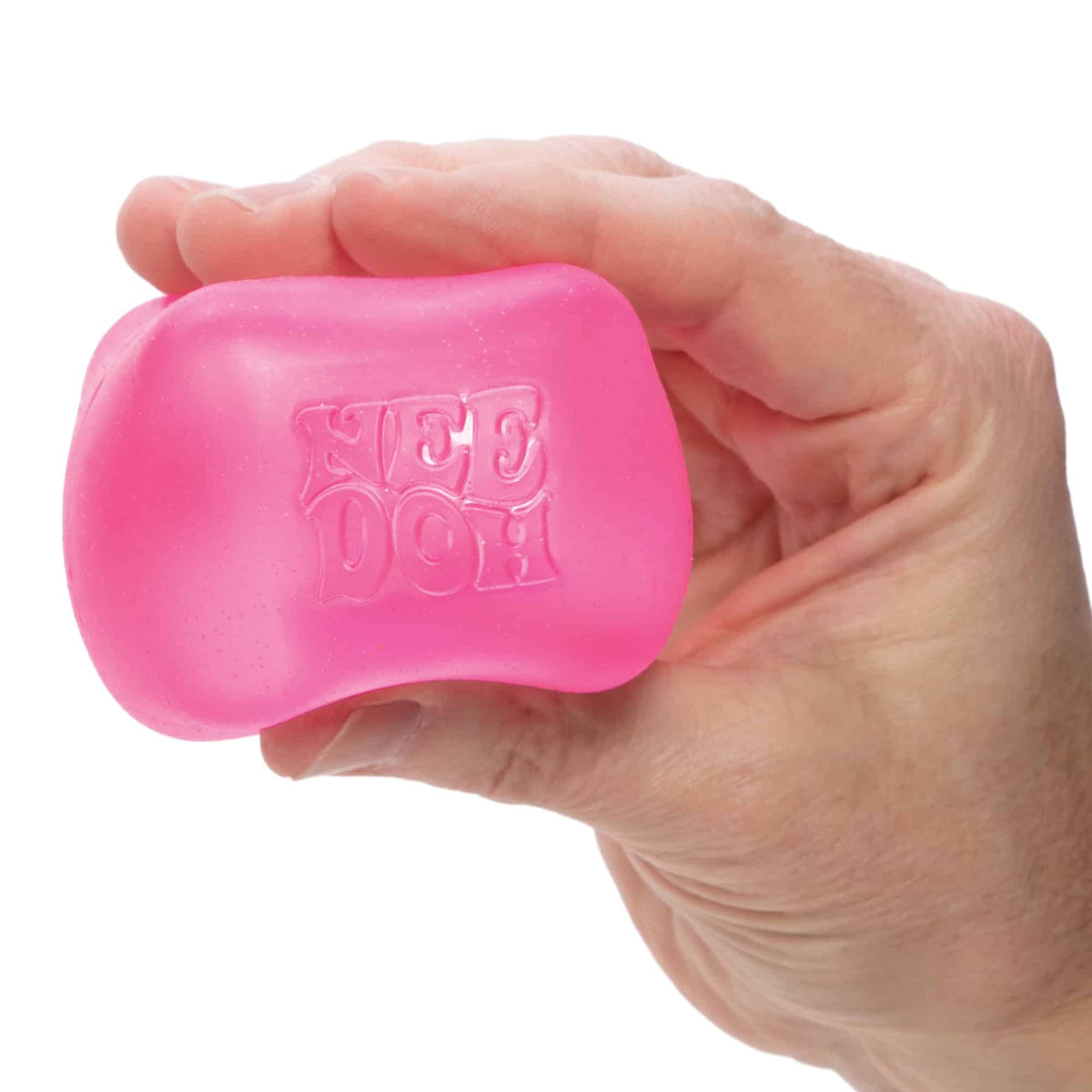 Pink semi-transparent square NeeDoh Nice Cube stress reliever with soft goo filling