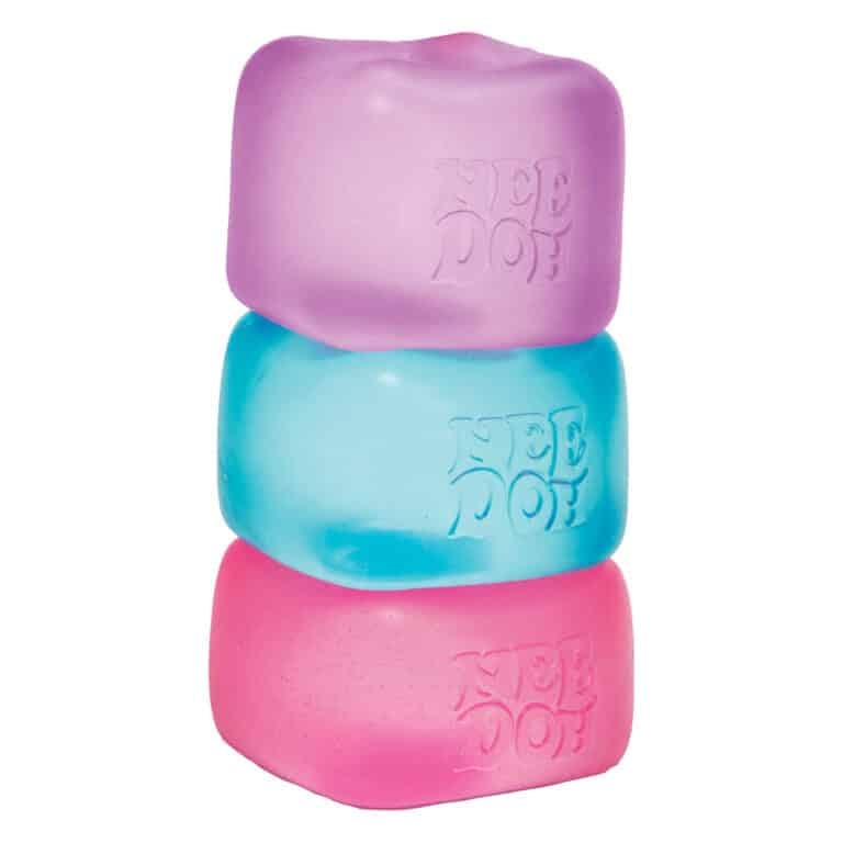 Stacked semi-transparent ice-like square NeeDoh Nice Cube sensory toy with groovy goo filling