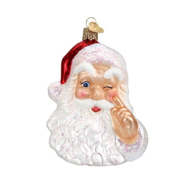 Red ceramic Santa ornament with white beard holding a finger to his nose.