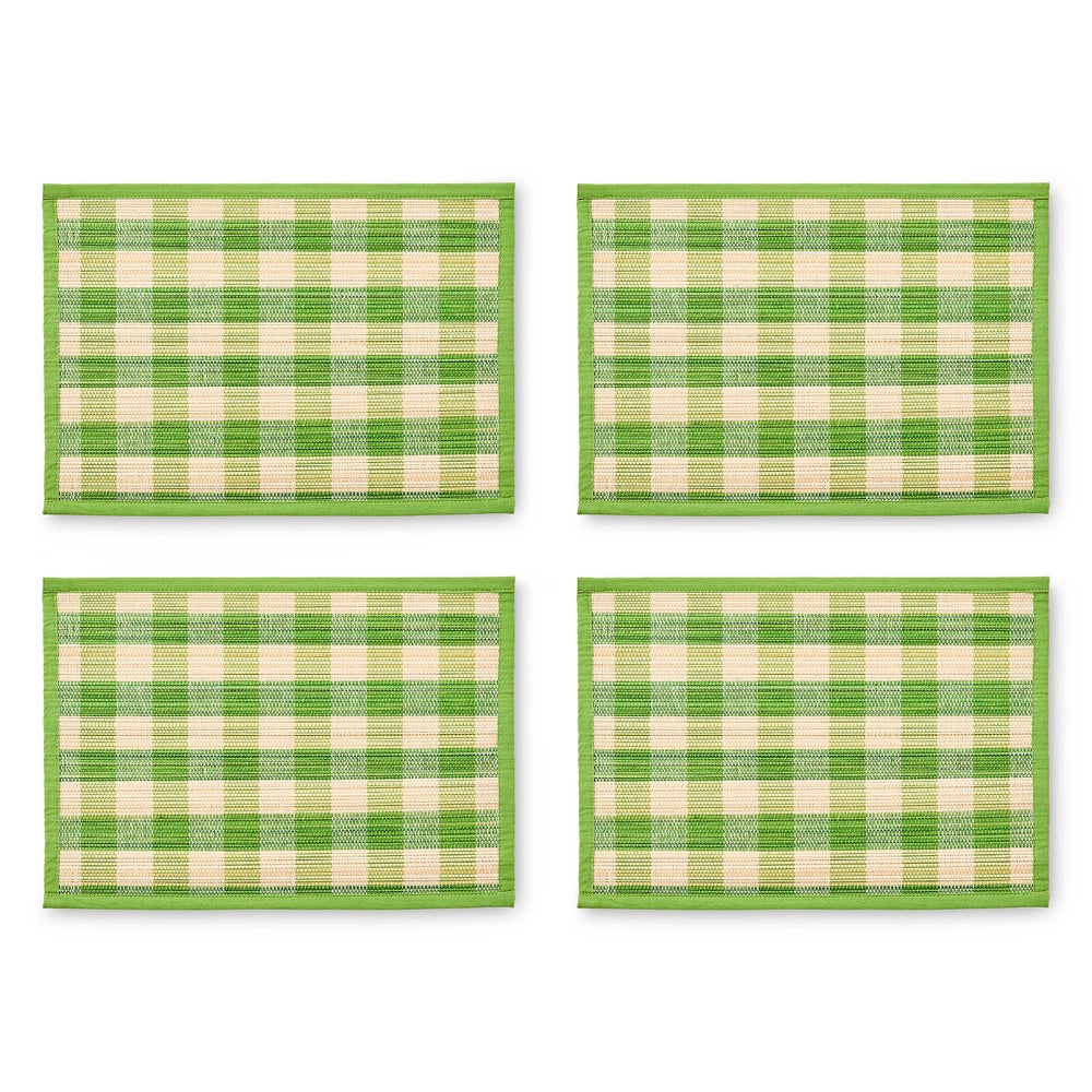 Set of four green and cream woven check straw placemats with a solid green border.