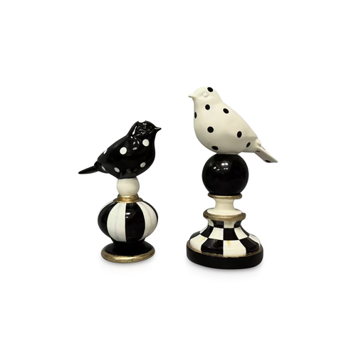 Two hand-painted bird topiaries with black and white patterns and gold leaf accents.