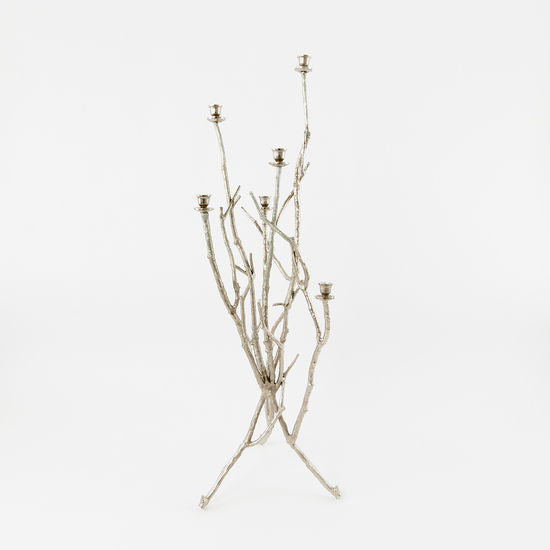 Aluminum candelabra with a natural twig-inspired silhouette.
