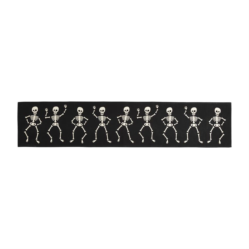 Cotton skeleton table runner with white bones on black background