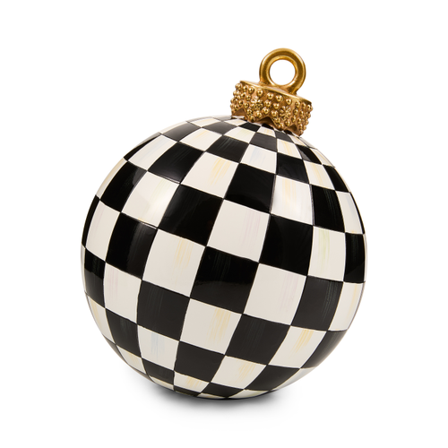 Black and white checkered tabletop ornament with a gold decorative cap and ring.