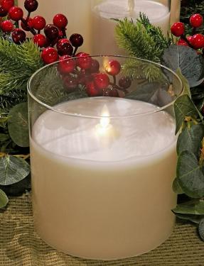 Cream-colored single-wick glass candle in a square six-inch by six-inch vessel.