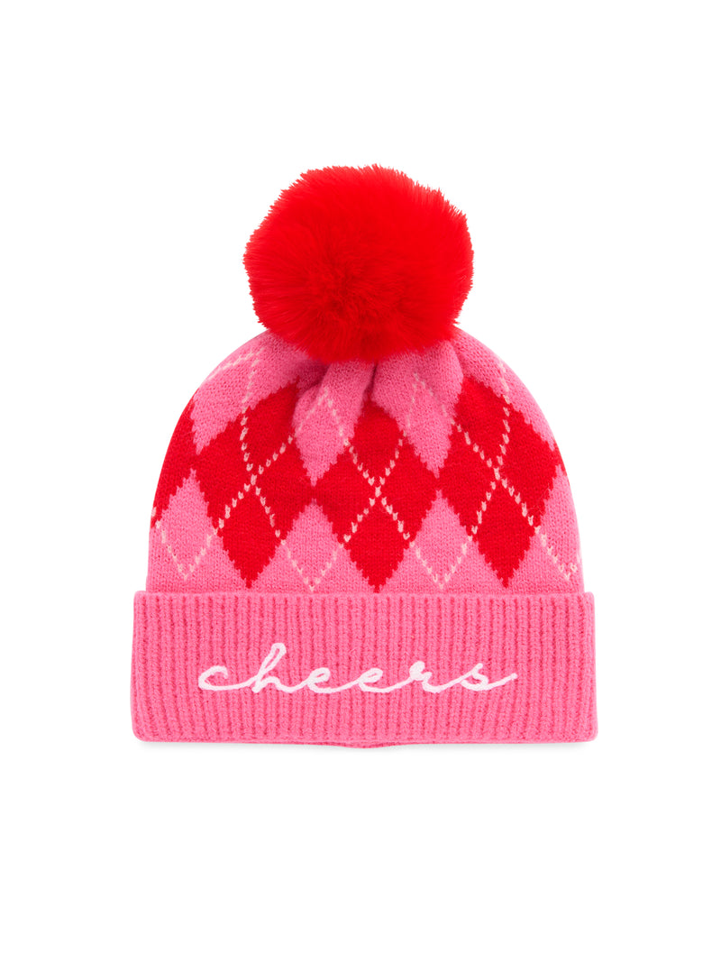 Pink and red argyle knit beanie with a red pom pom and white "cheers" script embroidery on the cuff.
