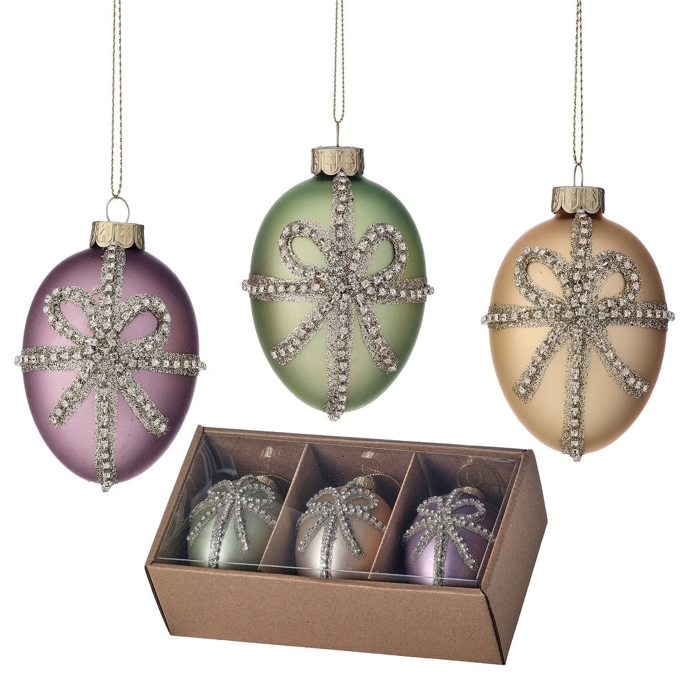 Glass egg ornament with jewel bow in gold