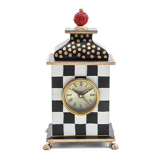 Hand-painted Courtly Check desk clock with black and white patterns, gold accents, and a red finial.