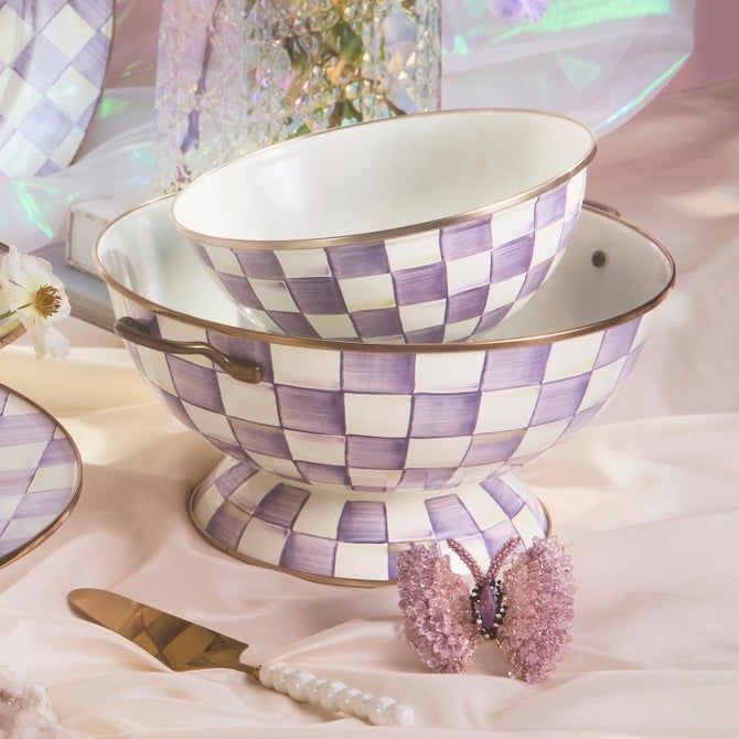 Violet checkered ceramic bowl with a wide rim and deep interior.