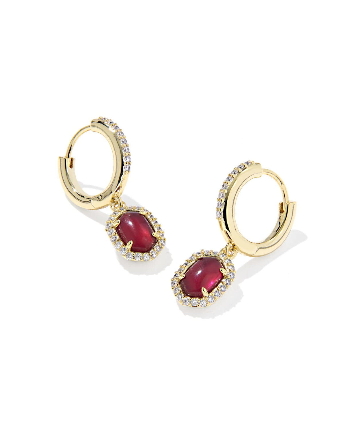 Daphne gold huggie earrings with oval red crystal charms and clear crystal frames.