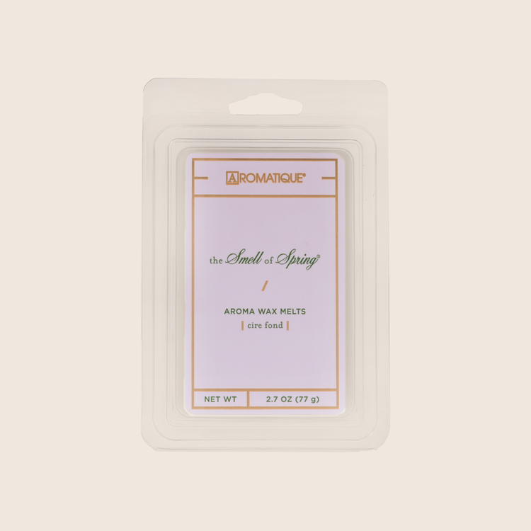 White wax melt cubes with pineapple, hyacinth, jasmine, rose, balsamic, and vanilla scents.