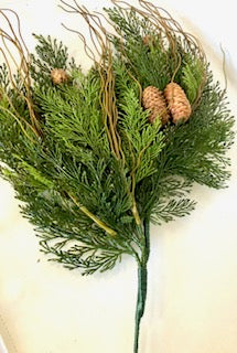 Needle Pine Pick featuring green cedar-like foliage, small pinecones, and curly brown twigs.