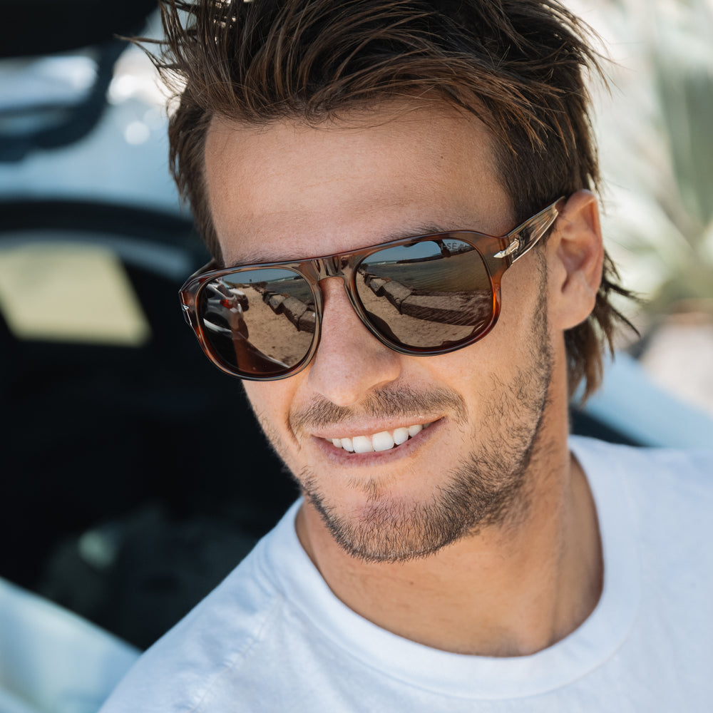 Man wearing Bayside Honey Tortoise sunglasses with Brown Polarized Lenses.