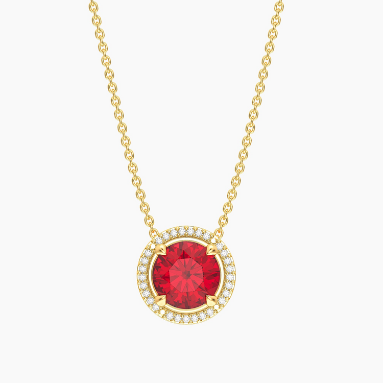 Gold-plated birthstone pendant necklace with a round red center stone and diamond halo.