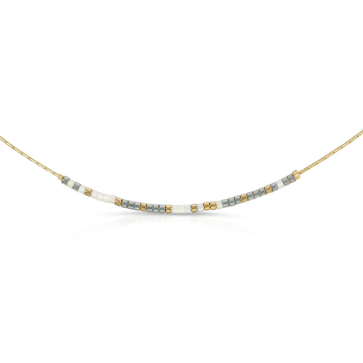 Choose Joy Morse code necklace with pearl white and gold-flecked gray beads on a gold chain.