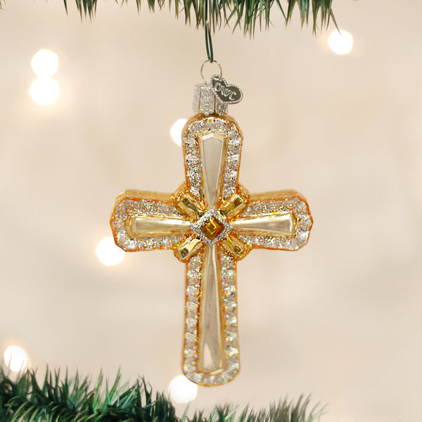 Holy Cross ornament featuring a gold metallic finish with an engraved cross silhouette on a matte black background.