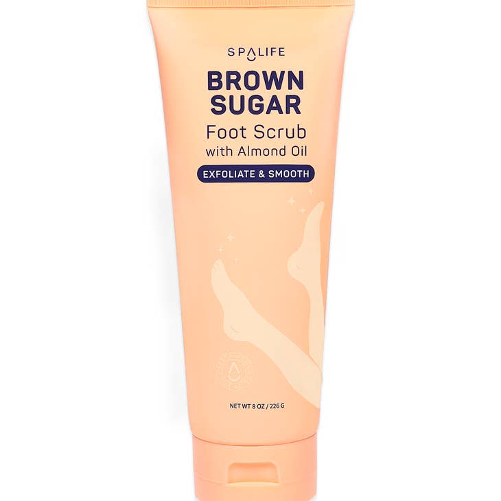 Brown sugar exfoliating foot scrub in a clear jar with visible granules.