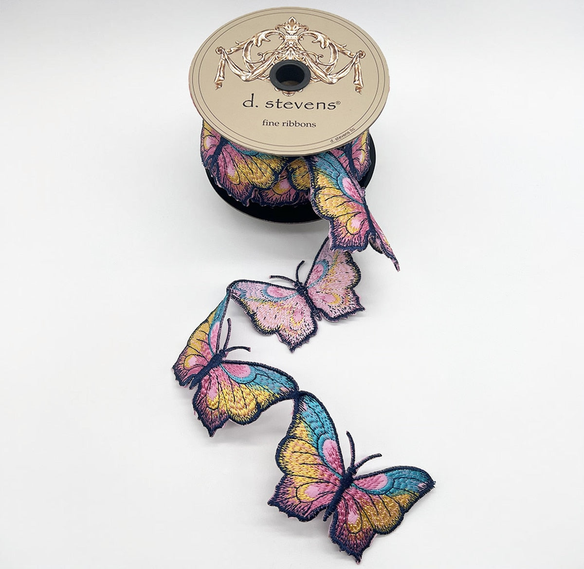 Pink felt butterfly garland with blue and yellow ribbon embroidery