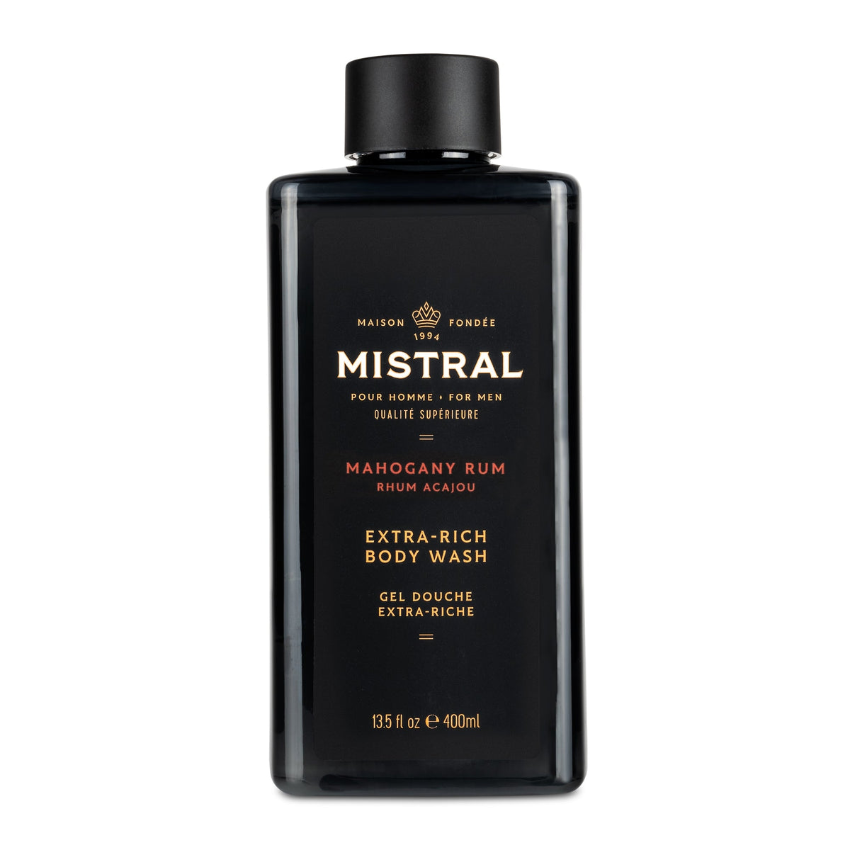 Bottle of Mahogany Rum body wash with a dark brown liquid visible through clear glass.