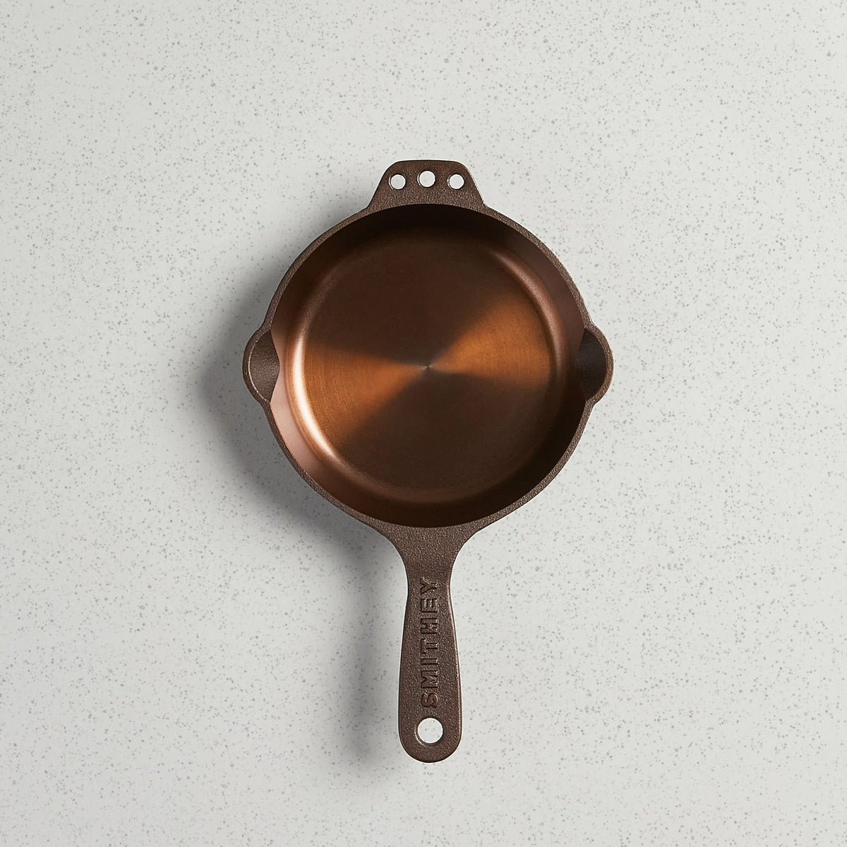 Satin-finish No. 6 skillet with polished interior non-stick surface and long handle.
