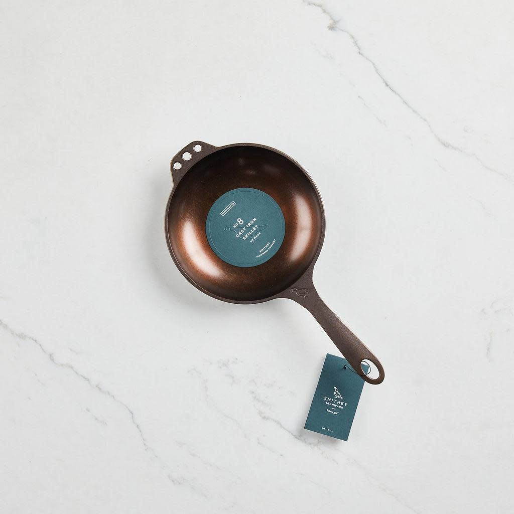 No. 8 Chef Skillet with satin-smooth polished finish, extended handle, and hanging holes on both sides.
