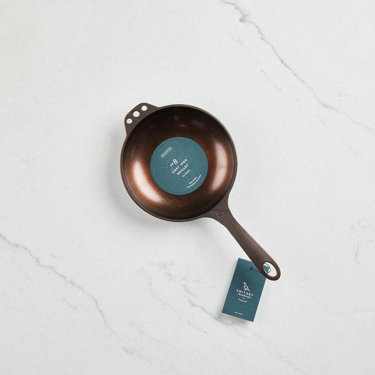 No. 8 Chef Skillet with satin-smooth polished finish, extended handle, and hanging holes on both sides.
