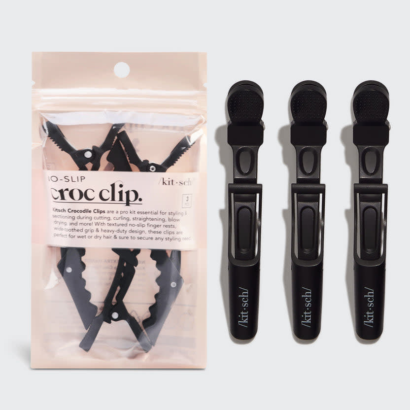 Black hinged crocodile clips with textured non-slip silicone coating and finger rests.