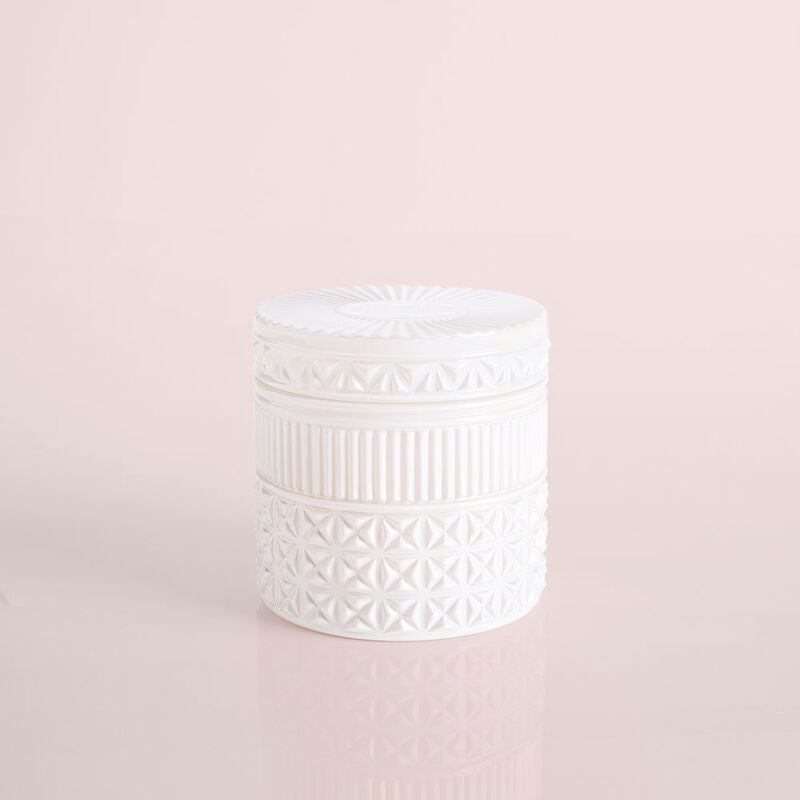 Volcano gilded faceted jar candle in gold metallic finish with a geometric cut-glass silhouette.