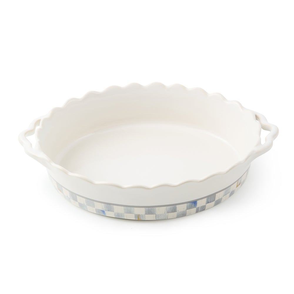 Oval stoneware baking dish with handle in natural earth tones