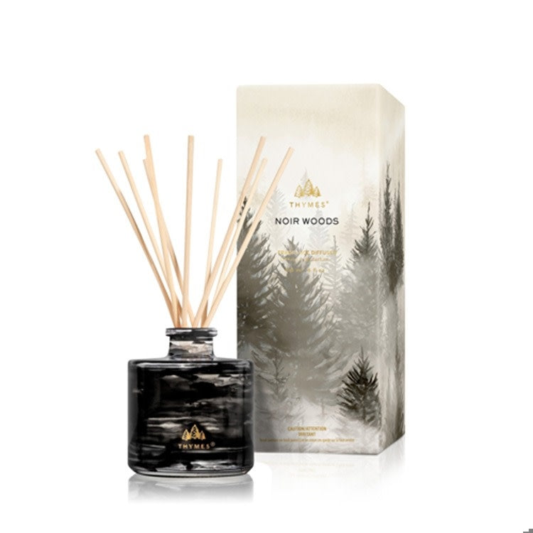 Noir Woods Petite Reed Diffuser bottle with dark wood scent notes