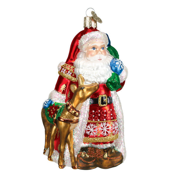 Nordic Santa ornament featuring a white snowman figure with red hat and scarf against a dark background.