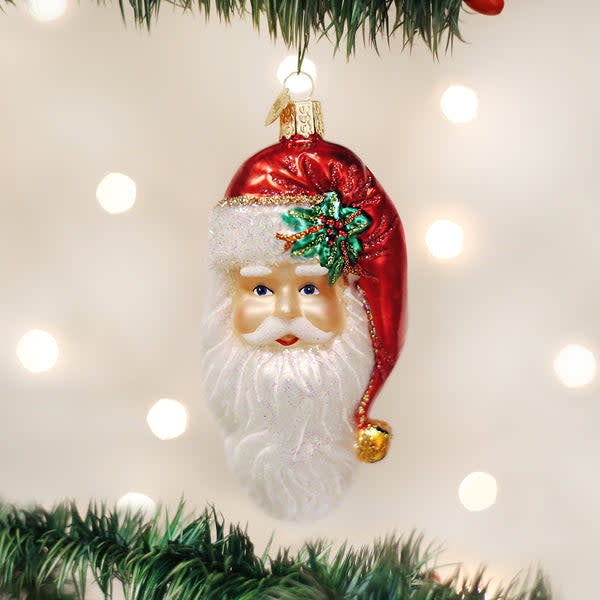 Glass Santa Claus ornament with red suit, white beard, gold glitter trim, and silver accents.