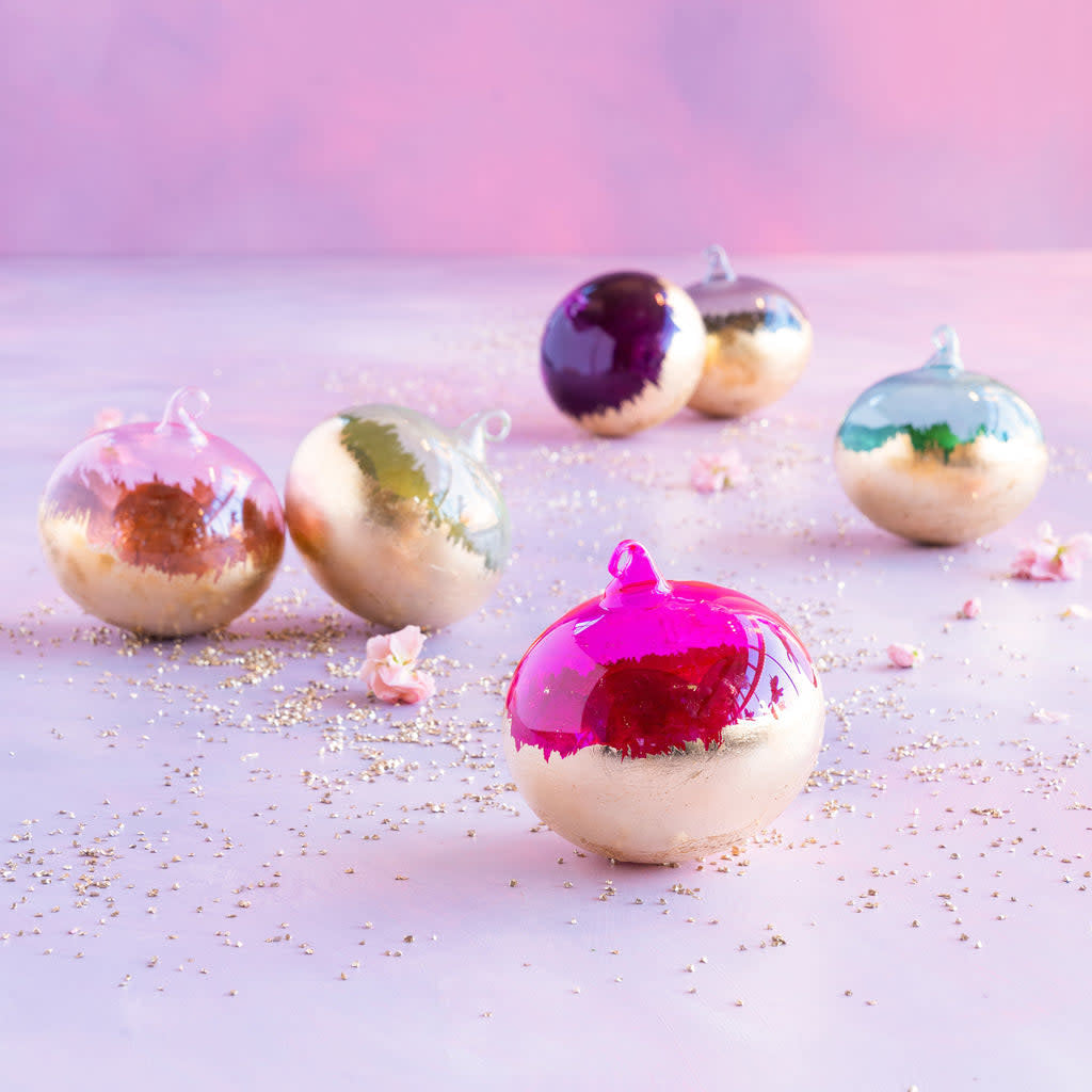 Hand-blown glass orb ornament with gold leaf detailing