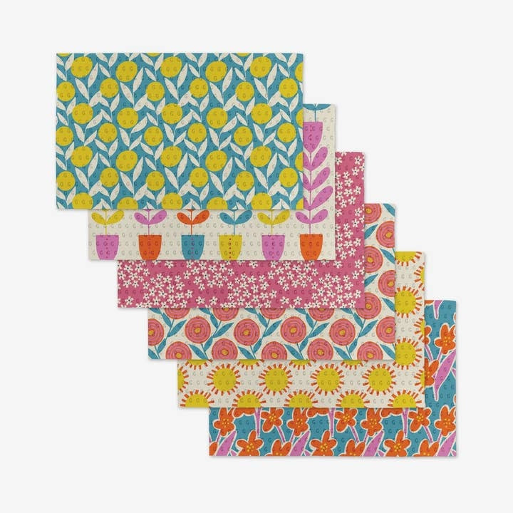 Set of reusable kitchen towels made from recycled materials in a neutral tone.