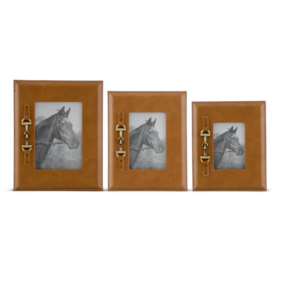 Three tan leather-style photo frames in varying sizes with gold horse bit accents.