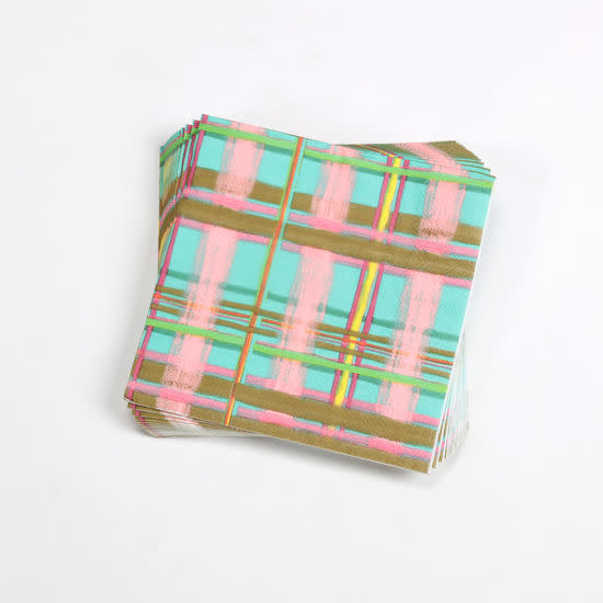 White paper napkin with a plaid pattern