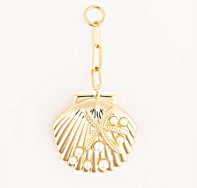 18K gold plated tropical bag charm featuring a seashell with a starfish and pearl accents.