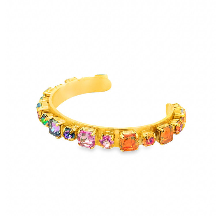 Antique gold-plated brass cuff bracelet with candy crush colored crystals.