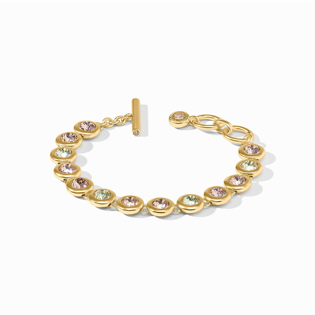 Gold-plated Rainbow Tennis Bracelet with pink and green glass stones and a toggle closure.