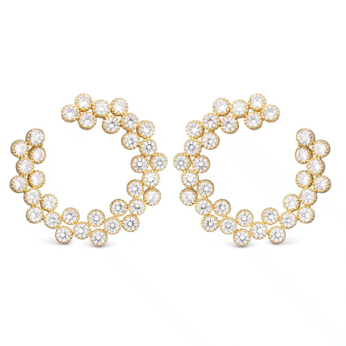 Gold open circle earrings featuring a double row of round-cut cubic zirconia stones.