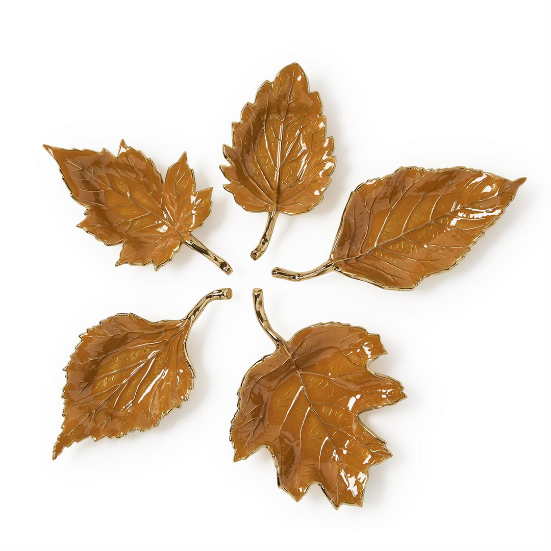 Set of five Autumn Allure enameled leaf trays in warm brown with gold metallic edges.