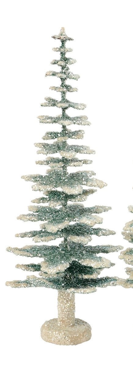 Paper Evergreen tree with mica glitter accents in green standing on a flat surface.
