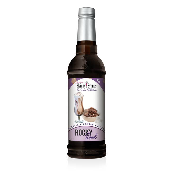Bottle of sugar-free vanilla almond syrup with a white label.