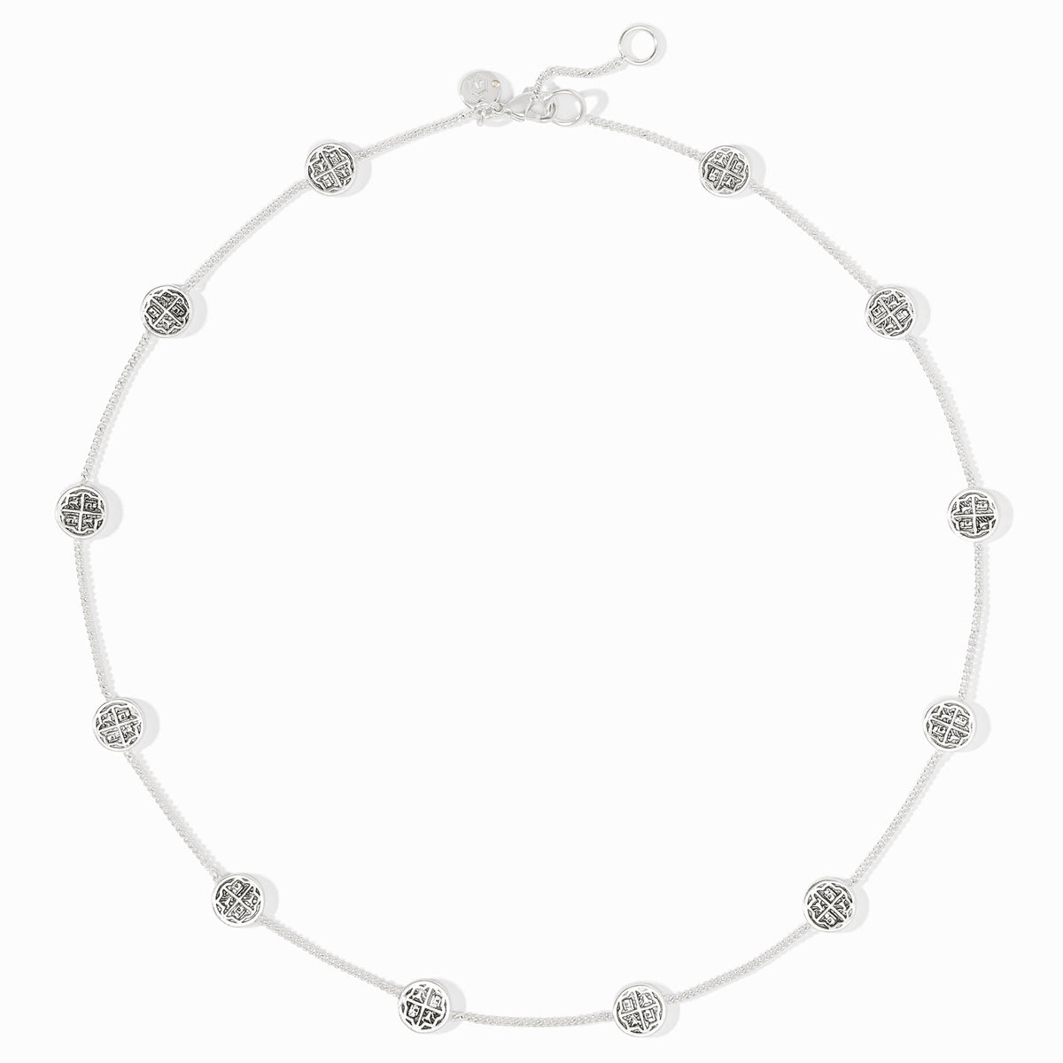 Valencia Delicate Station Necklace in silver with circular patterned charms on a fine chain.